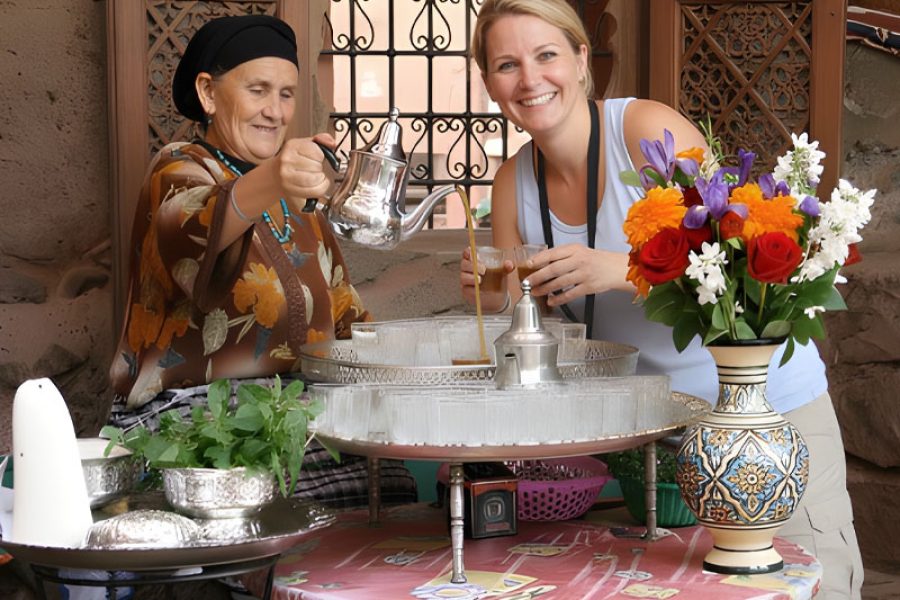 a tourist drinking tea in a Atlas Mountains tour