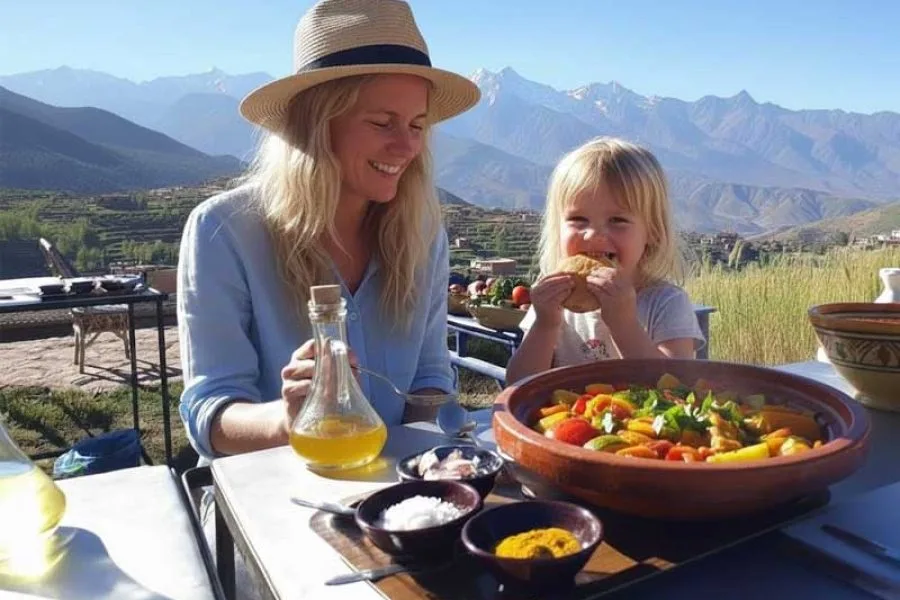 Mother and daughter eating at a family-friendly Atlas Mountains Cooking Class.