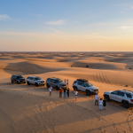 Traveler enjoying panoramic view on a Marrakech day trip to the Atlas Mountains.