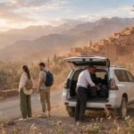 Travelers on a sunset tuk tuk ride through the Palmeraie, one of the best things to do in Marrakech - Things do to in
